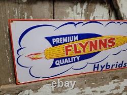 Flynns Vintage Sign Hybrid Farm Seed Corn Feed Embossed Tin Gas Oil Livestock