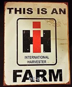 This is an IH Farm Distressed Retro Vintage Tin Sign Tin Sign 13x16, New
