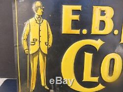 VINTAGE E. B. LAMME CLOTHING embossed tin sign BOZEMAN