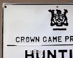 Very Good ONTARIO CROWN GAME PRESERVE HUNTING TRAPPING Embossed Tin Sign Vintage