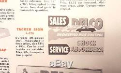 Vintage Original DELCO SHOCK ABSORBERS Tin Litho Tacker Sign w NOS Brochure 1952