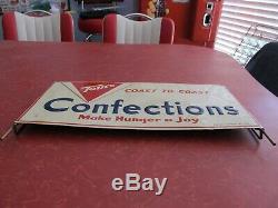 Vintage Rare Tom's Confections embossed tin sign with frame for store rack, 1963