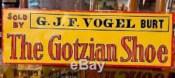 Vintage Sold by G. J. F. VOGEL Burt Iowa The Gotzian Shoe embosed Tin Sign 20 X 7