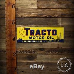 Vintage Tracto Motor Oil Embossed Tin Advertising Sign