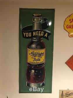 Vintage You Need A NuGrape Soda Vertical Embossed Tin Sign Bottle Graphic Stout