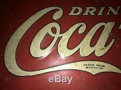 Vintage embossed tin Coca Cola sign dated 1933