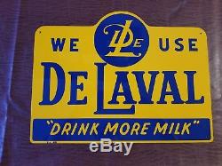 Vintage tin DeLaval Drink More Milk sign